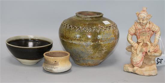 A Chinese green glazed jar, two other pottery jars and a pottery figure